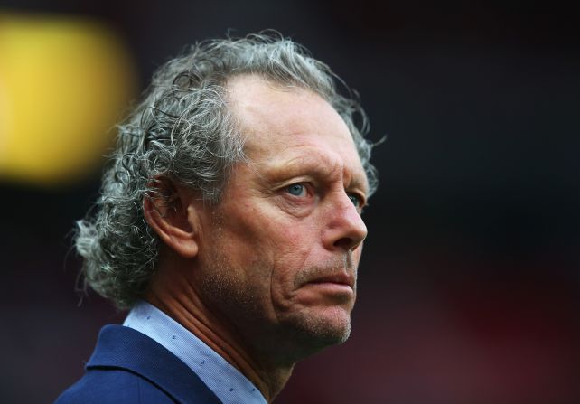Brugge manager Michel Preud'homme looks on from the touchline at Old Trafford.