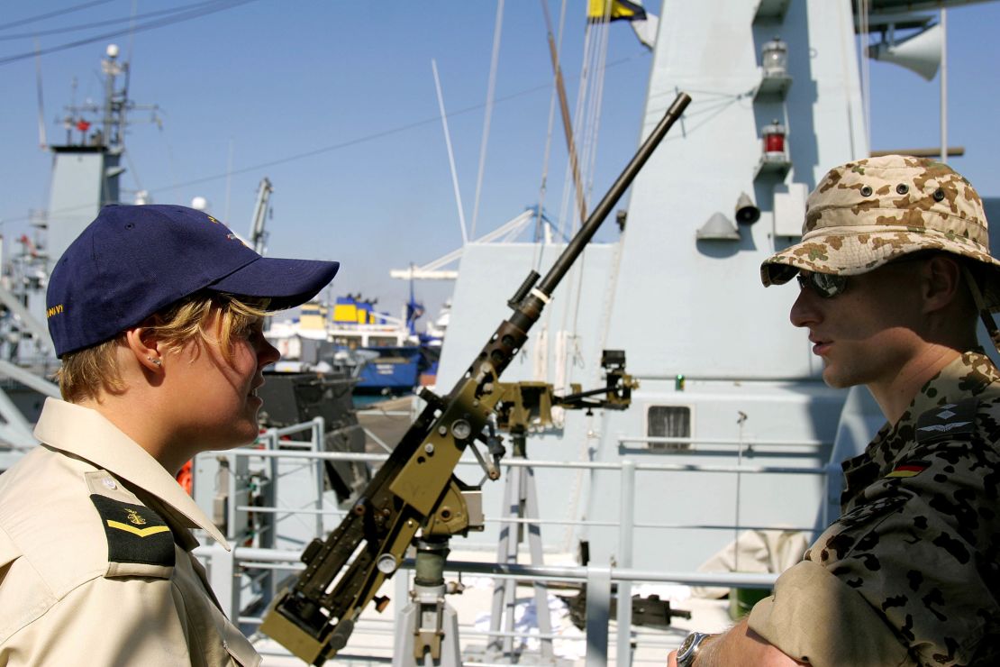 A female member of the Danish navy talks with a German soldier at a port in Cyprus in 2006.