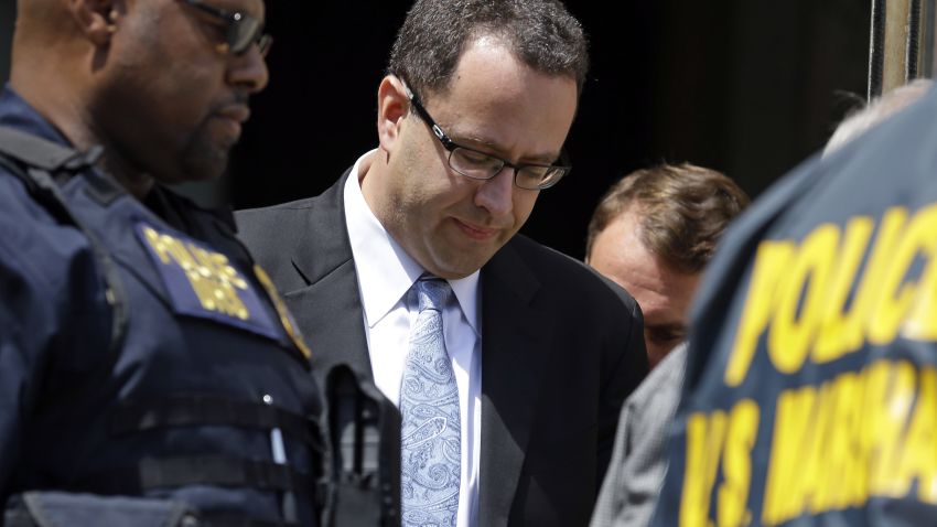 Former Subway pitchman Jared Fogle leaves the Federal Courthouse in Indianapolis, Wednesday, Aug. 19, 2015 following a hearing on child-pornography charges. Fogle agreed to plead guilty to allegations that he paid for sex acts with minors and received child pornography in a case that destroyed his career at the sandwich-shop chain and could send him to prison for more than a decade.  (AP Photo/Michael Conroy)