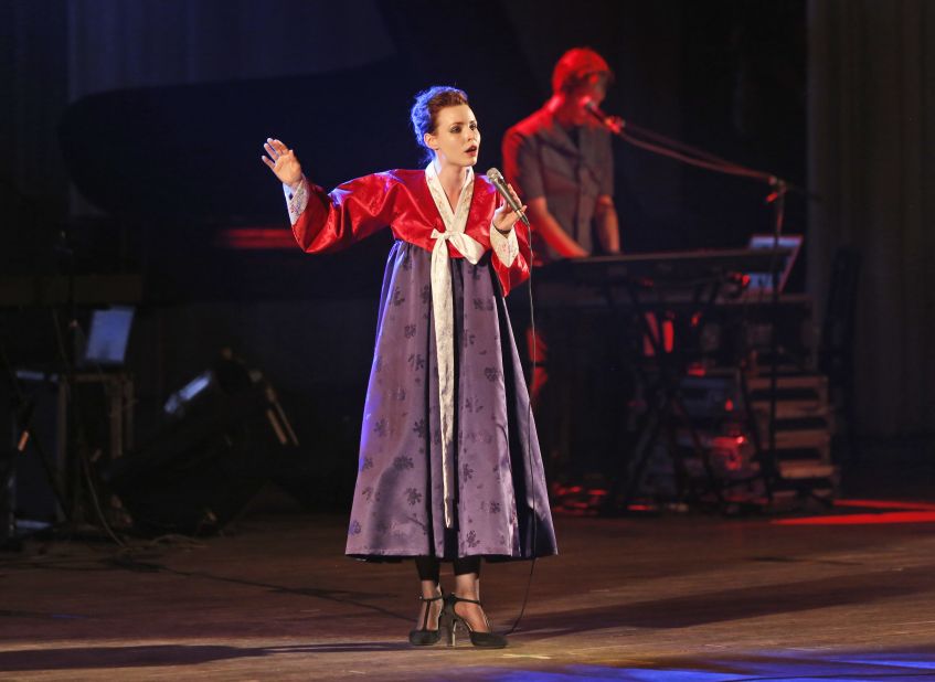 A member of Laibach wears a traditional Korean dress as she performs in Pyongyang, North Korea, on August 19.