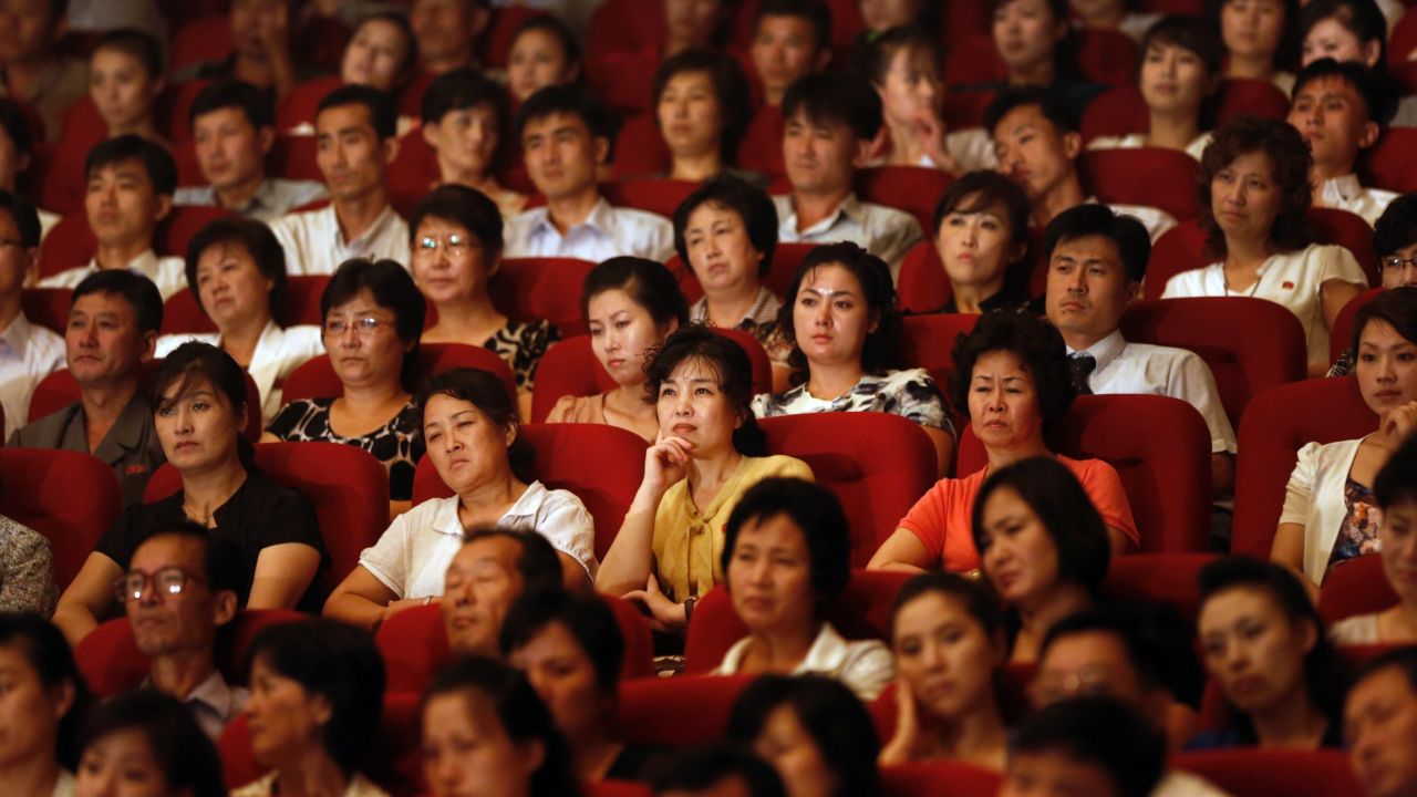 Spectators enjoy a performance by Laibach.