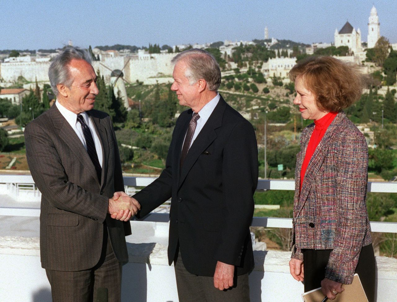 Carter shakes hands with Israeli Labour Party leader Shimon Peres in Jerusalem in March 1990. 