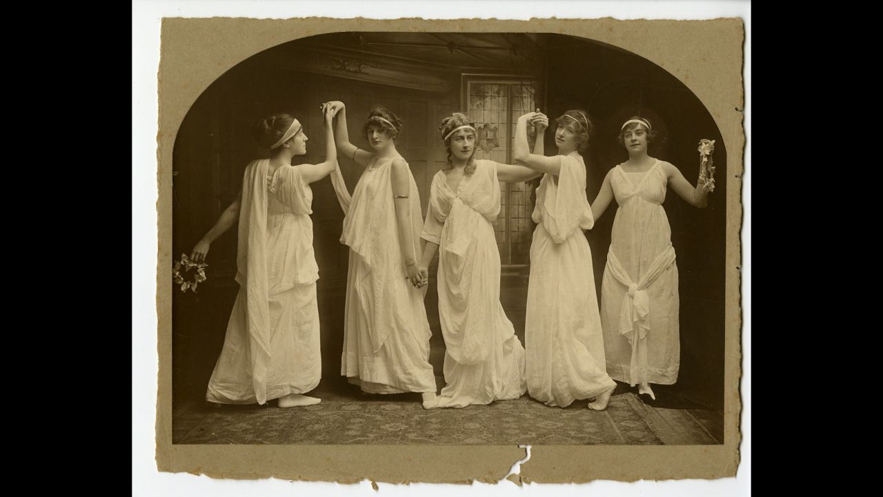 She was educated at the family's home by her mother, Clara, who encouraged her to read voraciously. She is seen here (in the center) at a dance class in Torquay in about 1904.
