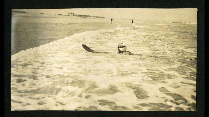 Christie was even snapped surfing in Muizenberg, South Africa, while on the round-the-world trip.