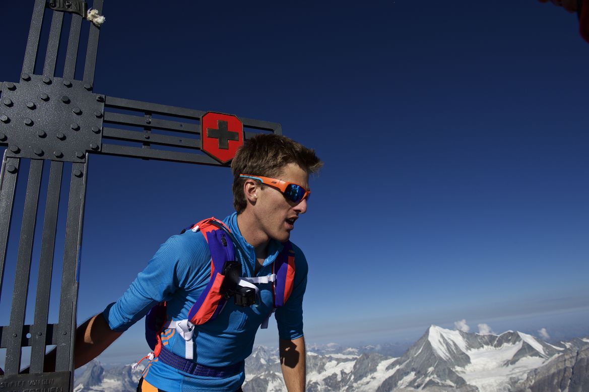 Andreas Steindl looks down from the top of one of the five peaks he crossed.