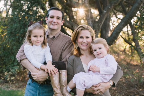 Cruz poses with his wife, Heidi, and his daughters Caroline and Catherine.