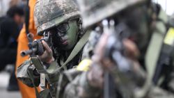 South Korean army soldiers aim their weapons during an anti-terror drill2 as part of Ulchi Freedom Guardian exercise, at Sadang Subway Station in Seoul, South Korea, Wednesday, Aug. 19, 2015. U.S. and South Korean forces launched Monday an annual joint military exercises, Ulchi Freedom Guardian, for a 12-day run to prepare for a possible North Korea's attack. (AP Photo/Ahn Young-joon)