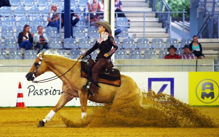 Schumacher, who won both the junior and individual European Reining titles earlier this year,   can be seen here on Sharp Dressed Shiner. The western-style riding event sees competitors guide their mounts through a series of circles, spins and stops.  