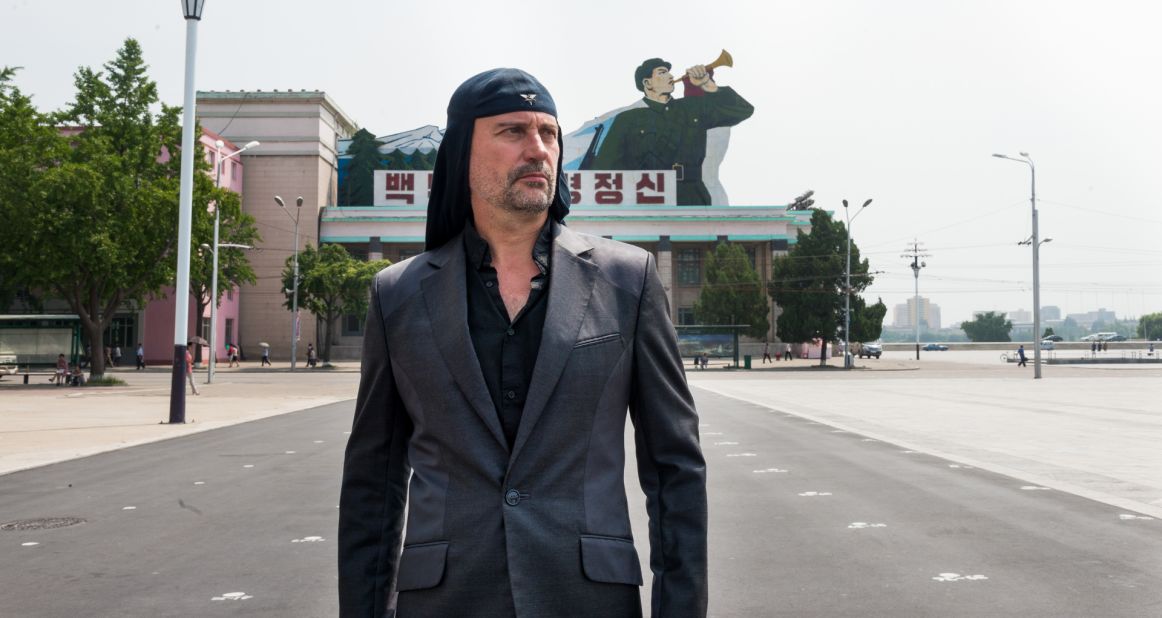 Milan Fras, front man for Laibach, poses at the Kim Il-sung Square before the band's performance in North Korea.