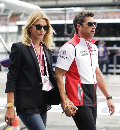 In January, Fink filed for divorce. Dempsey and Fink are pictured before the German Grand Prix at Hockenheimring on July 20, 2014 in Hockenheim, Germany.