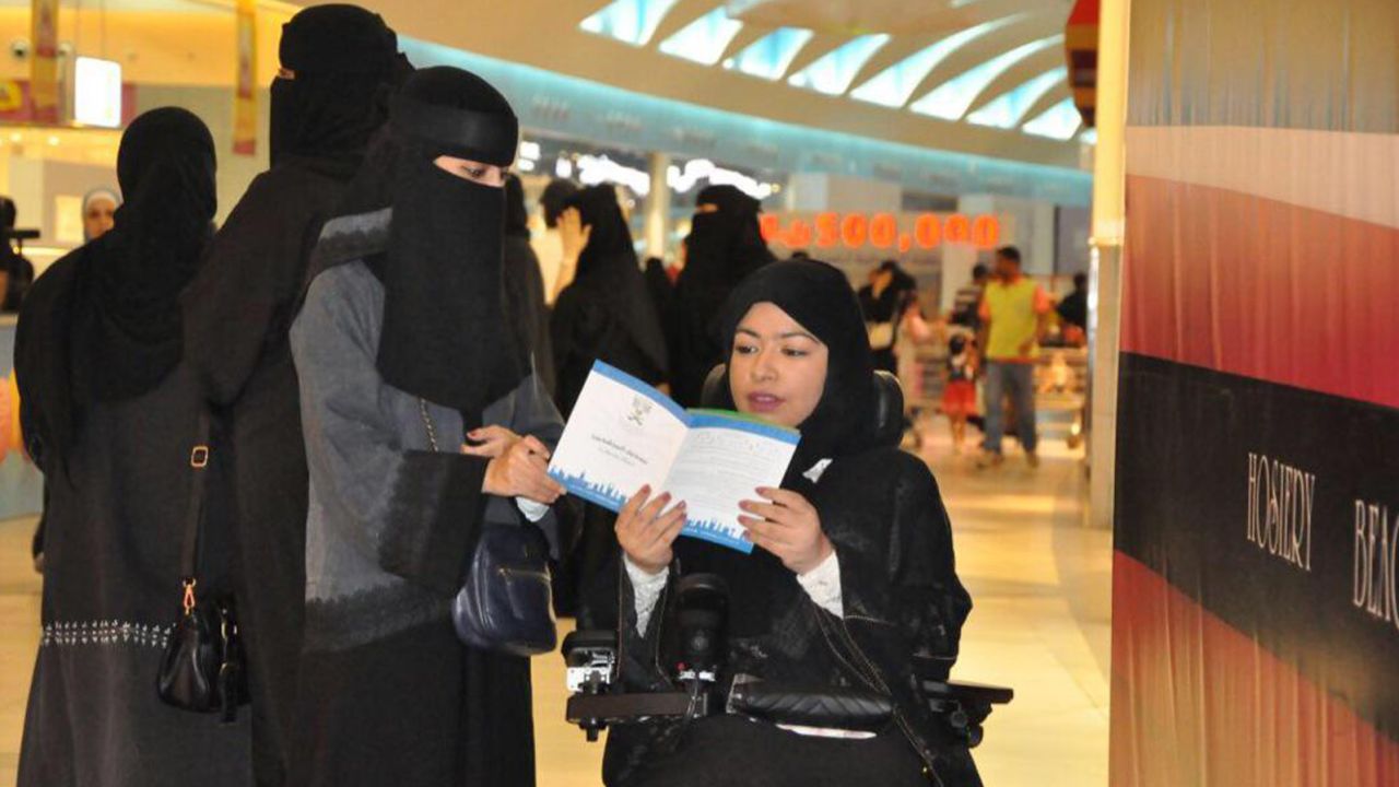 Women distribute leaflets to raise awareness among citizens to participate in the upcoming municipal elections on August 21 in Al Dammam, Saudi, Arabia. 
