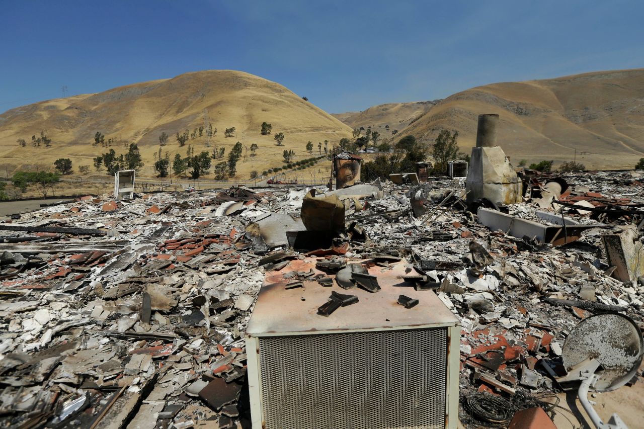 The charred remains of a property is seen in Livermore on August 20.