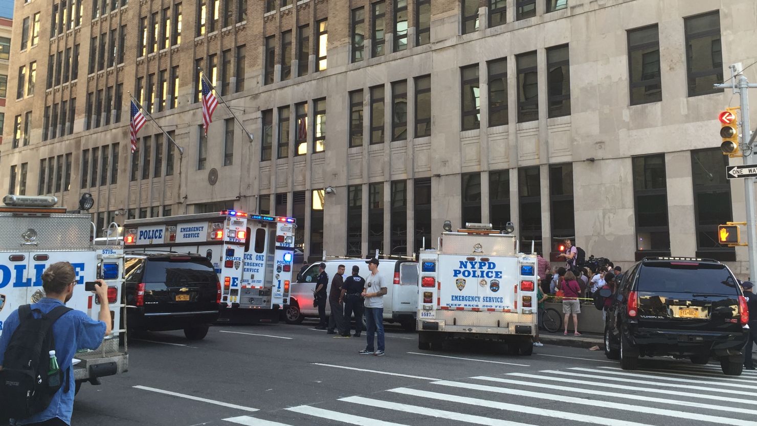 A heavy police presence outside the federal building entrance on Varick Street in New York. 
