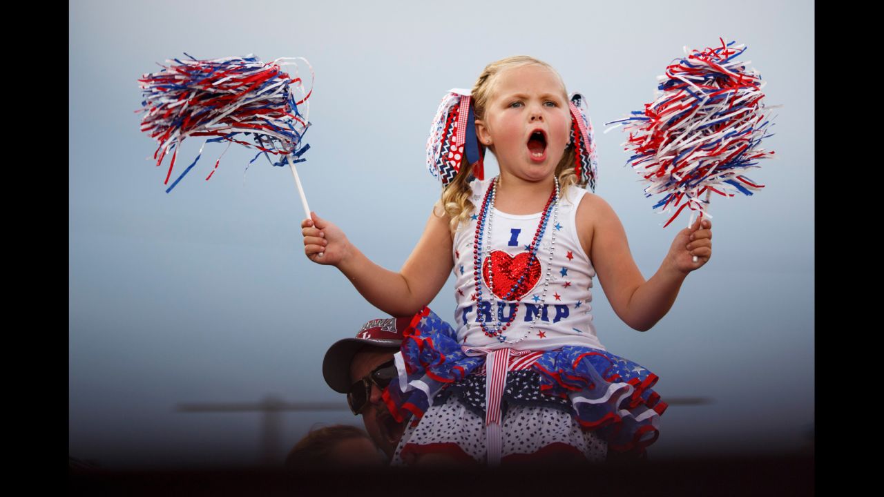 A young supporter of Republican presidential candidate Donald Trump cheers at a pep rally in Mobile, Alabama, on August 21, 2015. Trump brought 30,000 supporters -- according to the City of Mobile -- from deep red Alabama to a pep rally in a football stadium, the latest sign that the Republican front-runner has broad, nationwide strength.