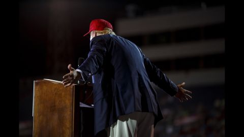 At times appearing more prepared than usual -- referencing what seemed to be notes on his podium and relaying new statistics about illegal immigration to his crowd -- a joyful Trump offered to sign copies of his book, waved his arms to encourage applause at some of his one-liners and made an effort to his Southern crowd by calling the Bible his favorite book and lamenting the decline of the Alabama steel industry. "I'd like to have the election tomorrow," he said at one point. "I don't want to wait."