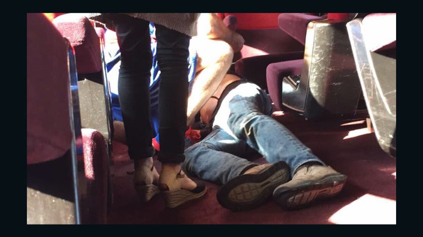 In this photo provided by Christina Cathleen Coons, a person lies on the floor after an incident on a high-speed train traveling from Amsterdam to Paris on Friday, Aug. 21, 2015. A gunman opened fire on the train wounding several people before American passengers subdued him, according to officials and one of the Americans involved. (Christina Cathleen Coon via AP)