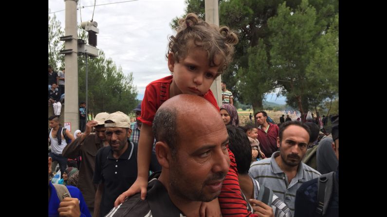 Ibrahim Masri and his 3 year old daughter Bayan. "We've been degraded, humiliated," Masri said. "My daughter, in Syria, she was an angel. Now look at her. We are not animals."