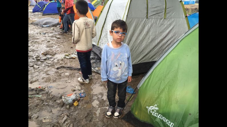 Mohammad Helwa is 5 years old and from Aleppo. He likes Bugs Bunny and the color blue. The Helwa family say they have been waiting for four days to cross the border. They are from one of the front ines in Aleppo. The kids' grandmother was injured twice by sniper fire and was too old to join them on this treacherous journey. 