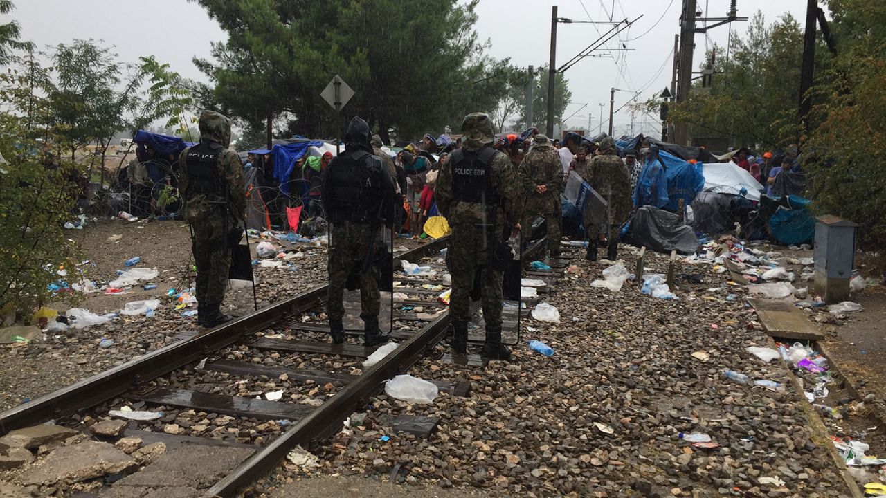Macedonian police and military guard the border. They say it is not up to them to open the border. 