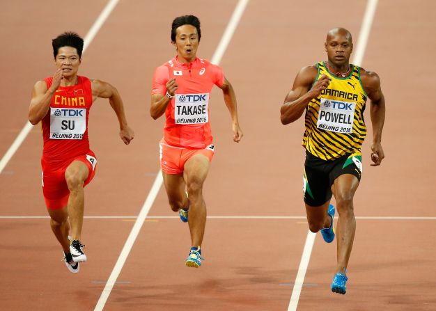 Bolt's fellow Jamaican Asafa Powell (right) also went through along with China's Bingtian Su (left) but Japan's Kei Takase (center) missed out. 