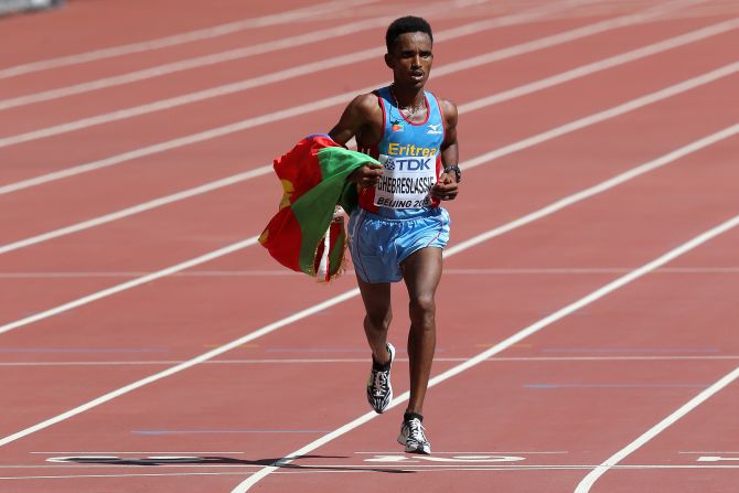 Ghirmay Ghebreslassie made history by winning Eritrea's first gold medal at a world championships and, at the age of 19, becoming the youngest men's marathon titleholder. 
