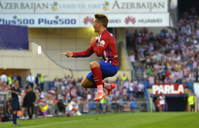 Atletico Madrid kicked off the new Spanish season with a 1-0 victory over promoted Las Palmas. French forward Antoine Griezmann, Atletico's top scorer in 2014-15, celebrates his first-half winner.  