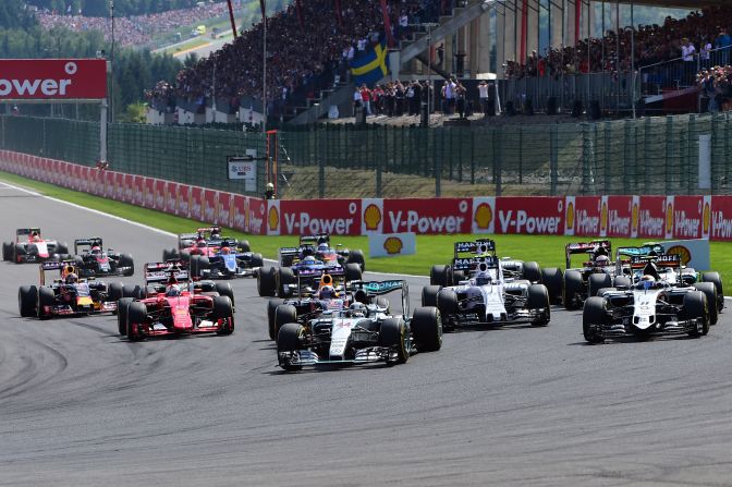 Hamilton (center) started on pole and led going into the first corner.