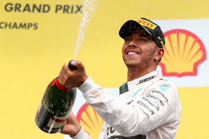 Lewis Hamilton celebrates after winning the Belgian Grand Prix at Spa-Francorchamps Sunday.