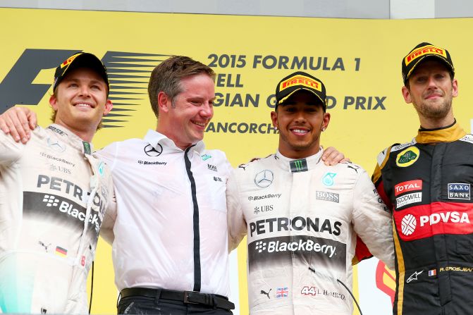 Hamilton's Mercedes teammate, Nico Rosberg (far left) finished second while Romain Grosjean of Lotus completed the podium in third place.  <br />