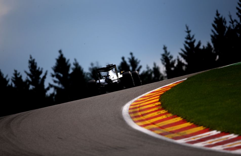 Hamilton driving at Spa amid the picturesque trees of the Ardennes Forest. The Briton's victory at the Belgium GP was  his sixth of 2015.