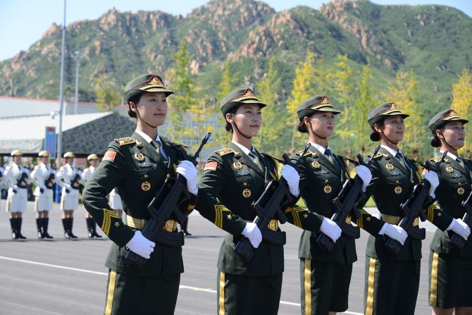 Cheng Cheng says a total of 62 servicewomen from the army, navy and air force will march alongside 145 male guards of honor.
