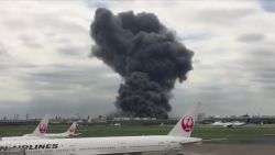 japan tokyo airport fire vause sot_00002111.jpg