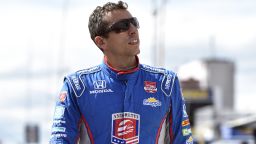 Justin Wilson, of England, walks on pit road during qualifying for Sunday's Pocono IndyCar 500 auto race, Saturday, Aug. 22,, in Long Pond, Pa. Wilson was injured during Sunday's race and air lifted to the hospital.