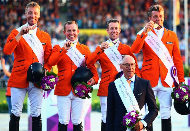 In the more traditional equestrian events it was the Netherlands who reigned. Here, the victorious Dutch Show Jumping team show off their gold medals on the podium. Pictured left to right: Jur Vrieling, Gerco Schroeder, Maikel van der Vleuten, Jeroen Dubbeldam with team captain Rob Ehrens at the front. The reigning world champions fended off Germany and Switzerland to take the title.