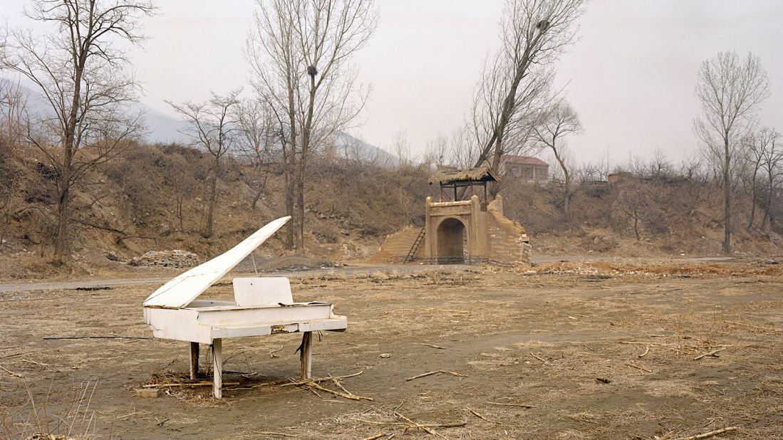 This fake baby grand piano has seen happier days. Cast aside in Huairou, a district nestled in northern Beijing, the piano is an old set piece used for wedding photography. In China, wedding photos are taken before couples tie the knot. Often these photos involve elaborate, fantasy scenes and multiple dresses. 