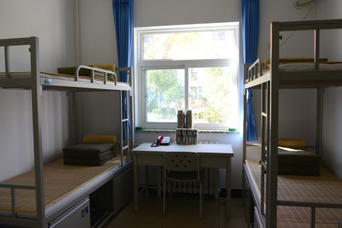 During the rehearsal, reporters were also given rare access to a military training base in Beijing. A dorm room is pictured here. 