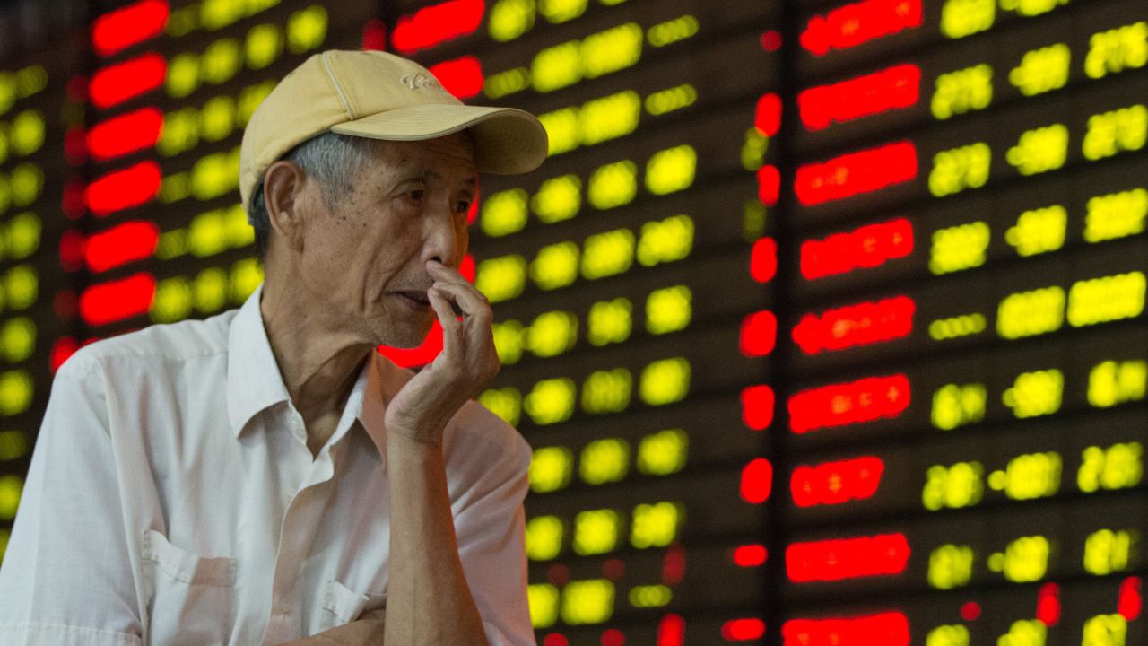A  Chinese investor watches stock prices at a brokerage house in Nanjing, China, on Monday, August 24. Chinese stocks plunged Monday, continuing to fuel a global sell-off.