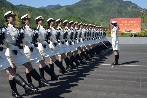 China's female guards of honor will attend the military parade on September 3 for the first time. In this picture, female soldiers of the People's Liberation Army attend a training session at a military base in Beijing on August 22. 