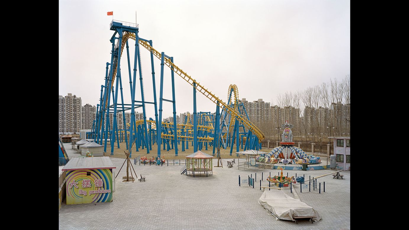 This thin, wiry rollercoaster, found at the Xiedao Holiday Village theme park, is juxtaposed with the density of the surrounding residential blocks.
