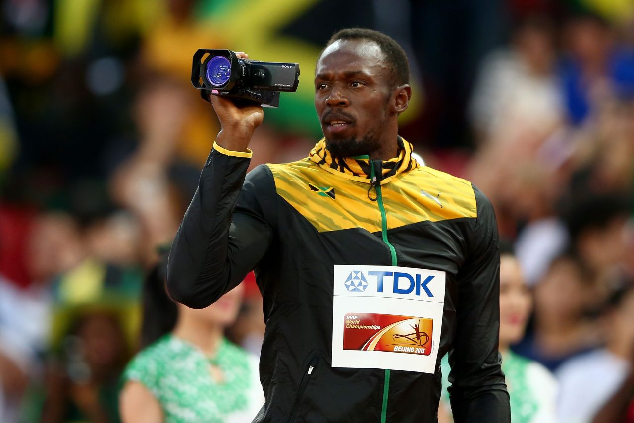 The best home video ever? Bolt records the medal ceremony during which he's given the gold he won in the men's 100 meter at the 2015 World Championships in Beijing.