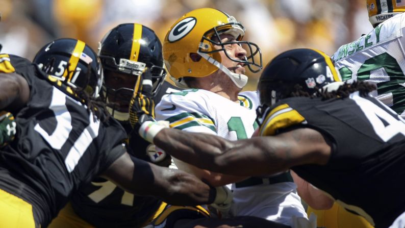 Green Bay quarterback Aaron Rodgers is sacked by Pittsburgh Steelers during an NFL preseason game in Pittsburgh on Sunday, August 23.