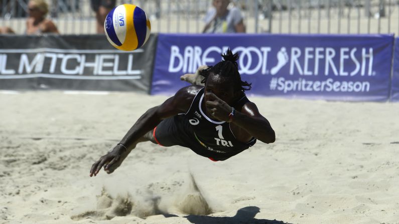Trinidad's Fabien Whitfield digs the ball Tuesday, August 18, at the World Series of Beach Volleyball. The tournament was held in Long Beach, California.