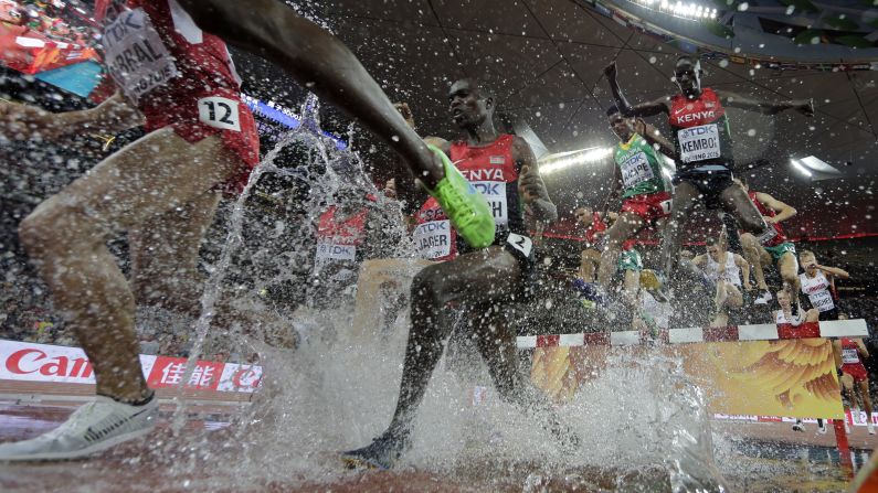 Kenya's Ezekiel Kemboi, top right, leaps over an obstacle Monday, August 24, on his way to winning the 3,000-meter steeplechase at the World Championships. Kemboi has dominated the event since 2009, winning gold at the past four World Championships. He also won Olympic gold in 2012.