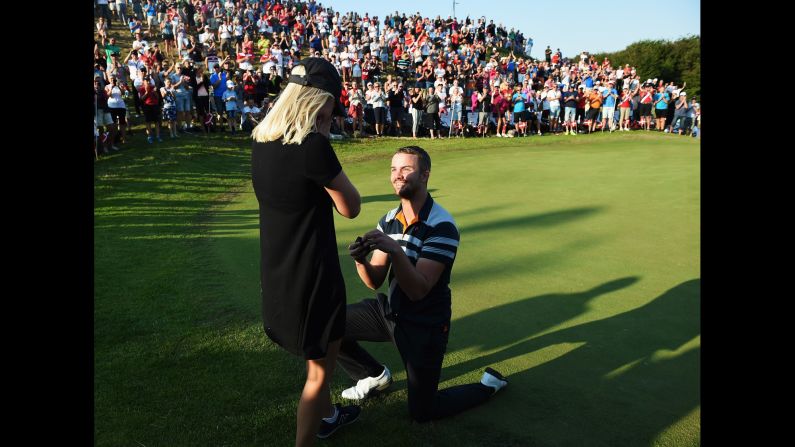 Danish pro golfer Andreas Harto proposes to his girlfriend, Louise De Fries, during the second round of a European Tour event in Aalborg, Denmark, on Friday, August 21. She said yes.