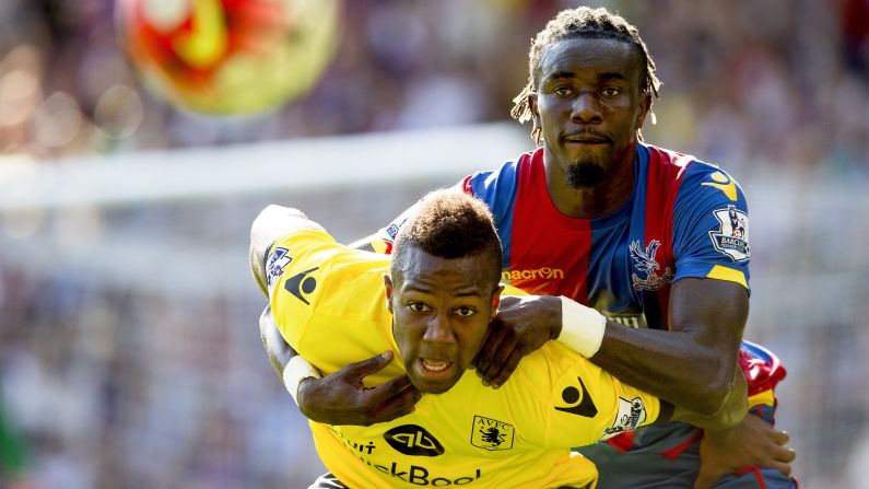 Adama Traore of Aston Villa, left, tries to shield Pape Souare of Crystal Palace during a Premier League match in London on Saturday, August 22.