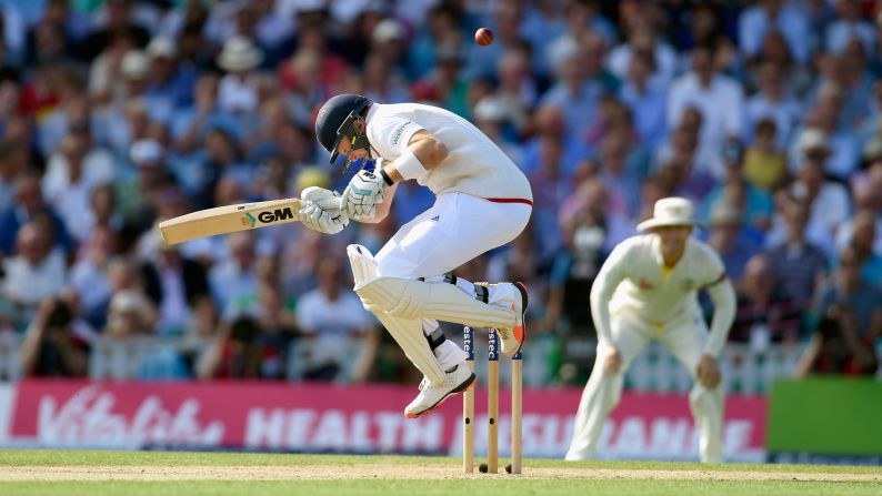 England batsman Joe Root avoids a short ball from Australia's Mitchell Johnson during a cricket match in London on Friday, August 21. England lost the match but still won the Ashes series. Root won the Compton-Miller Medal for player of the series.