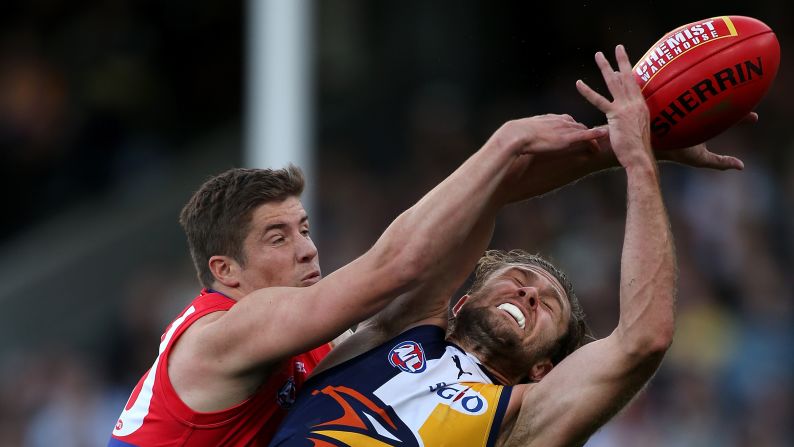 Daniel Pearce of the Western Bulldogs, left, spoils the mark for Mark Hutchings of the West Coast Eagles during an Australian Football League match in Perth on Sunday, August 23.