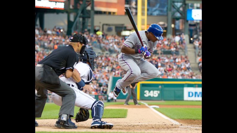 Texas' Adrian Beltre jumps out of the way of a wild pitch during a game in Detroit on Saturday, August 22.