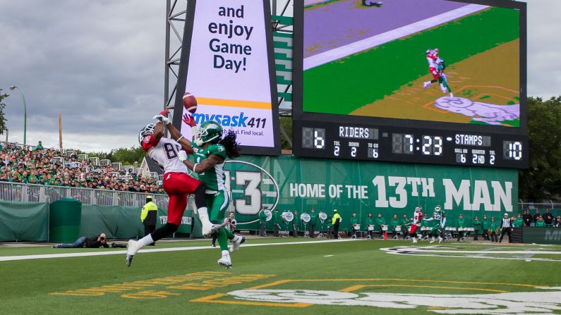 Saskatchewan's Marshay Green, right, breaks up a pass intended for Calgary's Eric Rogers during a CFL game in Regina, Saskatchewan, on Saturday, August 22. Green also intercepted the pass, which came on a two-point conversion attempt.