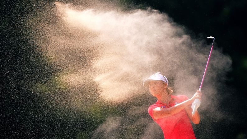 Lydia Ko hits out of a bunker during the final round of the Canadian Pacific Women's Open, which was held Sunday, August 23, in Vancouver, British Columbia. Ko won the tournament in a playoff.